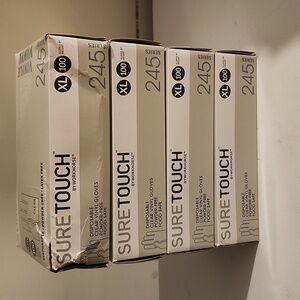 Sure touch vinyl gloves brand new